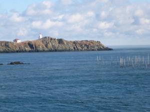 Lighthouse on a rocky bluff.