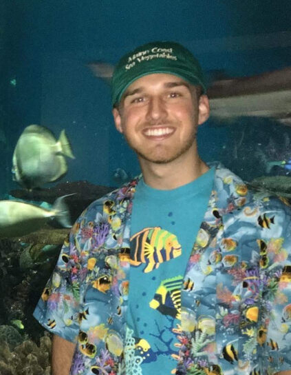 Camden Hunt at an aquarium