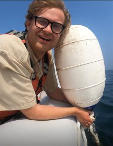Ben Capuano in a boat