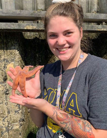 Jennifer Zdrojowy holding a starfish