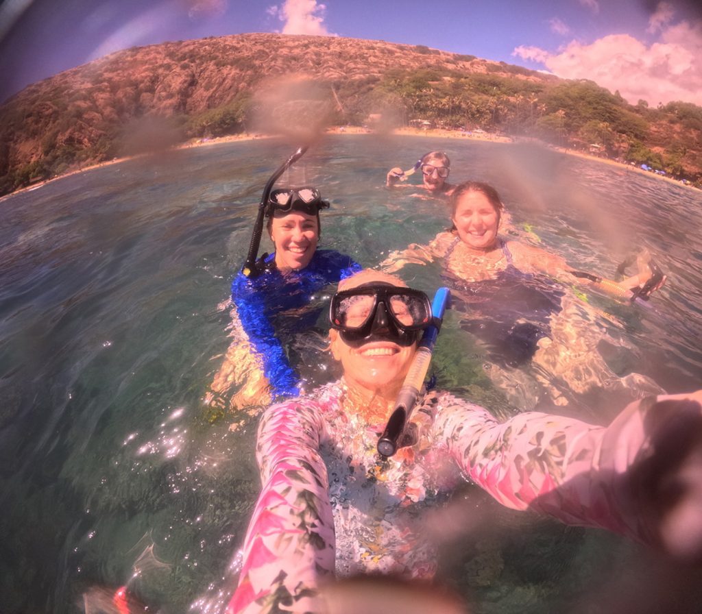 anesa Seraphin and Anne Rosa from Hawaii Sea Grant take Maine Sea Grant's Keri Kaczor and Ohio Sea Grant's Jill Bartolotta for a snorkeling adventure in Hanauma Bay.