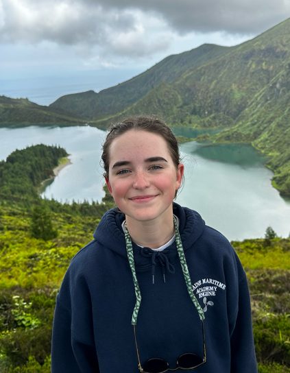 Margaret Archibald in front of a mountain lake